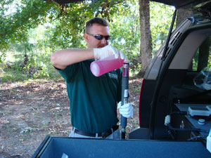 usgs employee processing water sample