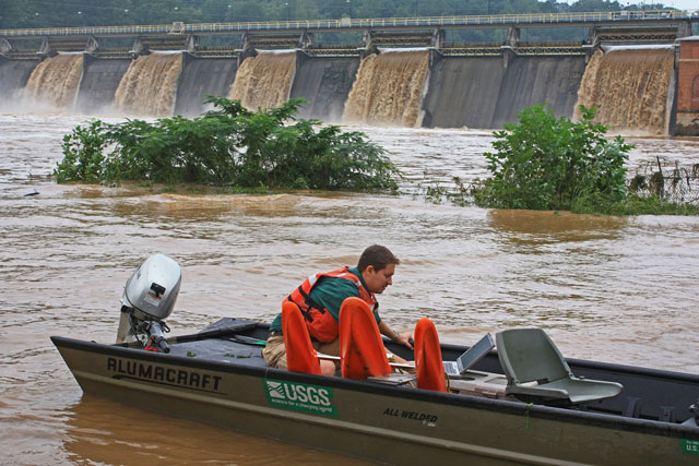 USGS hydrographer preparing to measure streamflow at the Chattahoochee River below Morgan Falls Dam water-monitoring site.  Photo by Alan Cressler, USGS.