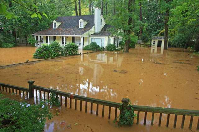 Flooded house on Woodward Way, next to Peachtree Creek at Northside Drive.